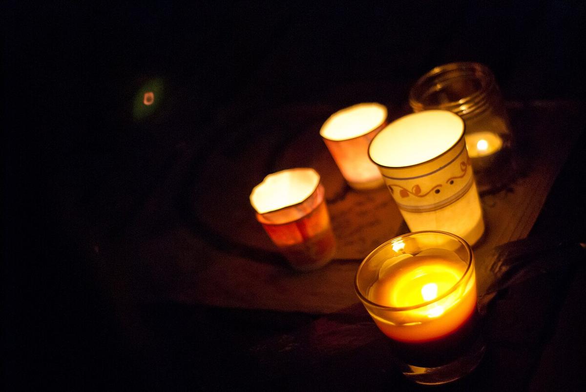 Candles burning at a night vigil